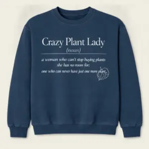 Blue jean crewneck sweatshirt with Crazy Plant Lady dictionary definition printed on the front.